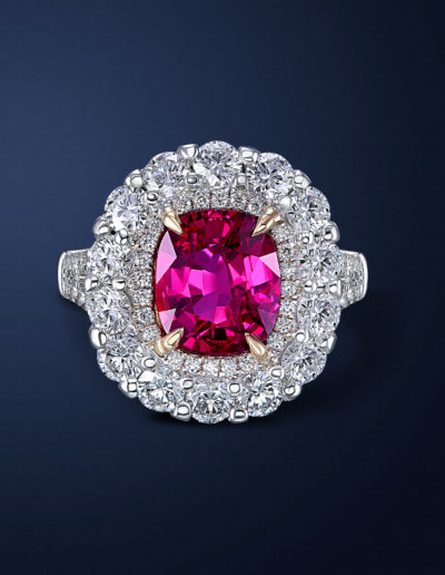 Handmade 18k white and yellow ring, center cushion cut natural ruby. Ring is crusted with pure white round diamonds in different sizes.